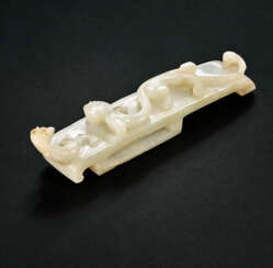 A WHITE JADE &#39;CHILONG&#39; SCABBARD SLIDE