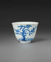 A BLUE AND WHITE &#39;PEACH BLOSSOM&#39; &#39;MONTH&#39; CUP