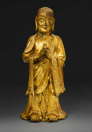 A GILT-BRONZE FIGURE OF KASYAPA - photo 1