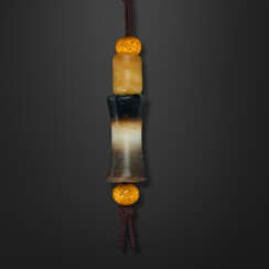 TWO EARLY JADE BEADS