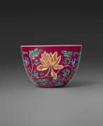 Product catalog. AN EXCEPTIONALLY RARE IMPERIAL RUBY RED-GROUND FALANGCAI ‘INDIAN LOTUS’ WINE CUP