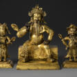 A GILT-COPPER REPOUSS&#201; FIGURE OF GUANDI AND TWO ATTENDANTS - Сейчас на аукционе