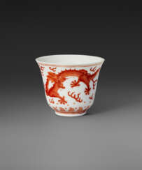 A SMALL IRON-RED-DECORATED &#39;DRAGON&#39; CUP