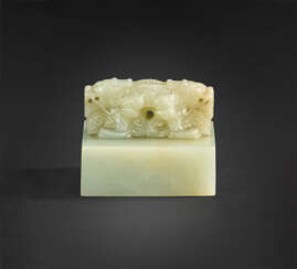 A SMALL WHITE JADE &#39;DOUBLE DRAGON&#39; SQUARE SEAL