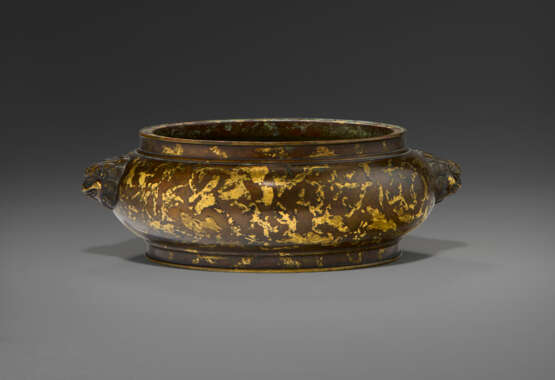 A GOLD-SPLASHED BRONZE BOMB&#201; CENSER WITH LION-MASK HANDLES - photo 2