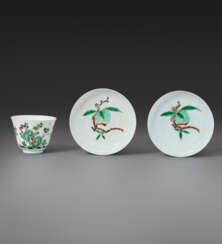 A RARE PAIR OF FAMILLE VERTE &#39;PEACH&#39; SAUCERS