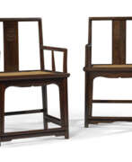 Sitzmöbel. A PAIR OF ZITAN LOW-BACK ARMCHAIRS
