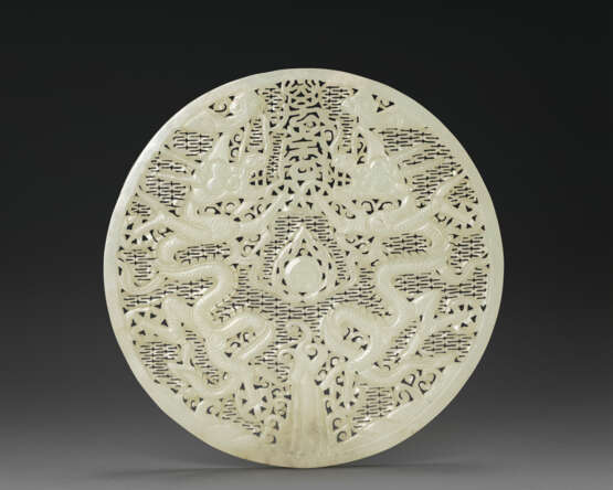 A RARE LARGE WHITE JADE CIRCULAR `DRAGON` PLAQUE - photo 1