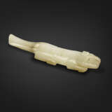 A RARE WHITE JADE TIGER PENDANT - photo 1