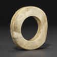 AN IVORY-COLORED JADE BRACELET - Сейчас на аукционе