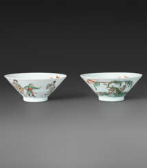 A PAIR OF FAMILLE VERTE CONICAL CUPS