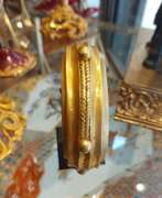 Overview. Nigerian 19th Century Gold and bronze trade currency Bracelet