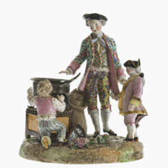 A porcelain group with chestnut seller and two putti