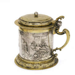 A lidded tankard with scenes from the Emmaus story