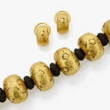 A necklace and earrings - photo 1