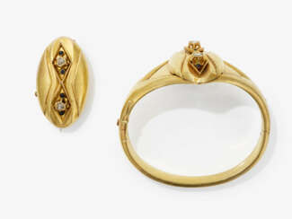 A bangle and brooch with diamonds and enamel