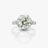 A ring with a large cushion-cut diamond - photo 2