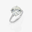 A classic solitaire ring set with a 4.93-carat brilliant-cut diamond - Аукционные цены