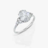An eternity ring decorated with an oval 2.05-carat diamond and small brilliant-cut diamonds - photo 1