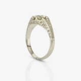 A ring with a brilliant-cut diamond - фото 3