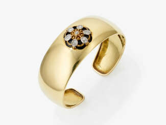 A bangle with diamonds and onyx