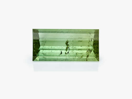 An unset green tourmaline weighing over 88 carats in a designer cut - photo 1