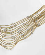 Neck jewellery. A fourteen-strand necklace with diamonds