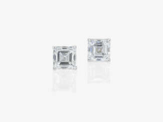 A pair of classic stud earrings set with square emerald-cut diamonds