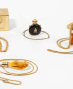 Accessories. 5 Anhänger mit Parfumflakons Lanvin "Arpege", Schiaparelli "Shoking you", Jacques Fath "Fath de Fath", Guy La Roche "Fidji" und Chopard