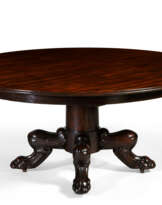 AN EMPIRE MAHOGANY EXTENDING CENTER TABLE
