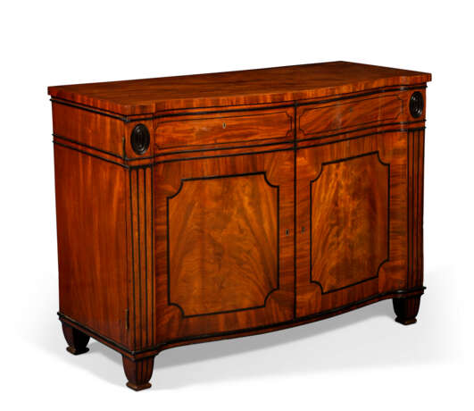 A REGENCY MAHOGANY AND PARCEL-EBONIZED COMMODE - photo 2