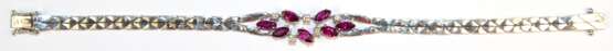 Rubin-Brillant-Armband, 585er WG, ausgefasst mit 7 Rubinen im facettierten Navetteschliff von zus. ca. 1,75 ct. und 5 Brillanten von zus. ca. 0,18 ct., LR-VVS, Kastenschloss mit 2 Sicherheitsachten, Ges.-Gew. 16,42 g, L… - Foto 1