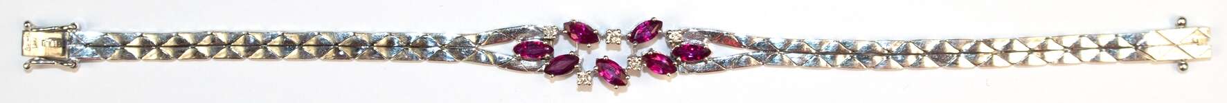 Rubin-Brillant-Armband, 585er WG, ausgefasst mit 7 Rubinen im facettierten Navetteschliff von zus. ca. 1,75 ct. und 5 Brillanten von zus. ca. 0,18 ct., LR-VVS, Kastenschloss mit 2 Sicherheitsachten, Ges.-Gew. 16,42 g, L… - Foto 1