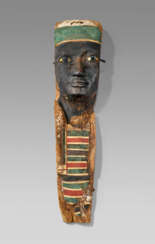 AN EGYPTIAN PAINTED WOOD MUMMY PORTRAIT