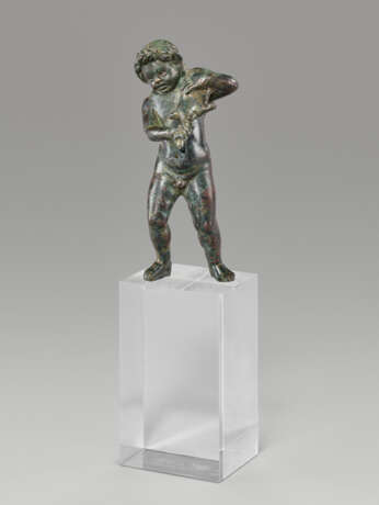 A ROMAN BRONZE SATYR SHOULDERING A WINESKIN - photo 1
