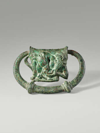 AN ETRUSCAN BRONZE HANDLE WITH A RECLINING SATYR - photo 1