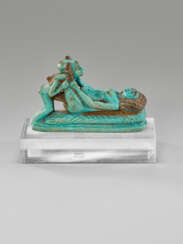 AN EGYPTIAN FAIENCE EROTICON