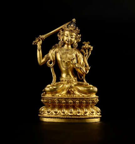A GILT COPPER ALLOY FIGURE OF MANJUSHRI - photo 1