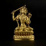 A GILT COPPER ALLOY FIGURE OF MANJUSHRI - photo 1