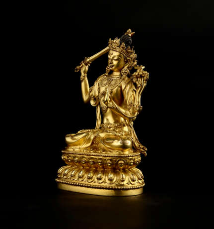 A GILT COPPER ALLOY FIGURE OF MANJUSHRI - photo 2