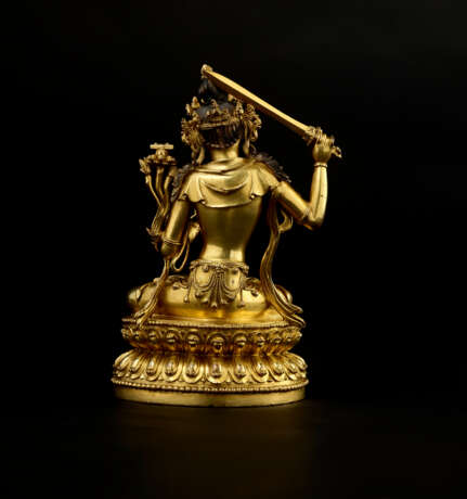 A GILT COPPER ALLOY FIGURE OF MANJUSHRI - photo 6