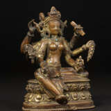 A GILT COPPER ALLOY FIGURE OF VASUDHARA - photo 5
