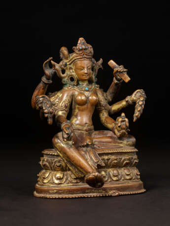 A GILT COPPER ALLOY FIGURE OF VASUDHARA - photo 5