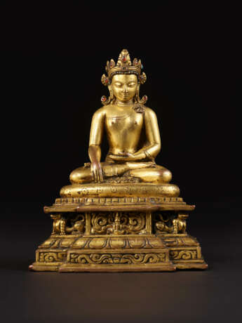 A GILT COPPER ALLOY FIGURE OF SHAKYAMUNI BUDDHA - photo 1