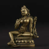 A SILVER AND COPPER INLAID BRASS FIGURE OF TARA - photo 1