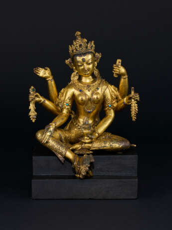 A GILT-COPPER ALLOY FIGURE OF VASUDHARA - photo 1