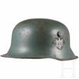 Kinderstahlhelm M 16/35 für "Heeresangehörige" mit beiden Abzeichen - Jetzt bei der Auktion