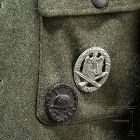 Feldbluse M 43 eines Hauptmanns der Artillerie - photo 5