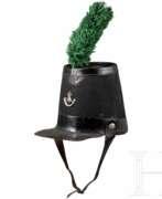 Produktkatalog. Tschako im Stil der King’s German Legion, leichtes Bataillon, 19. Jhdt.