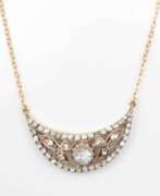 Overview. Gold necklace with diamonds